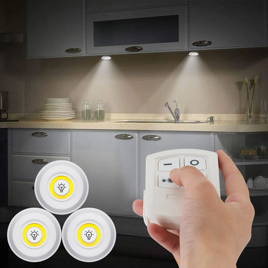 Dealworld rechargeable LED puck lights with remote control showing wireless stick on lights for kitchen under cabinets